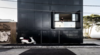 DKO + SLAB Add Black Metal Screen Façade To Vertical Dwellings In Australia